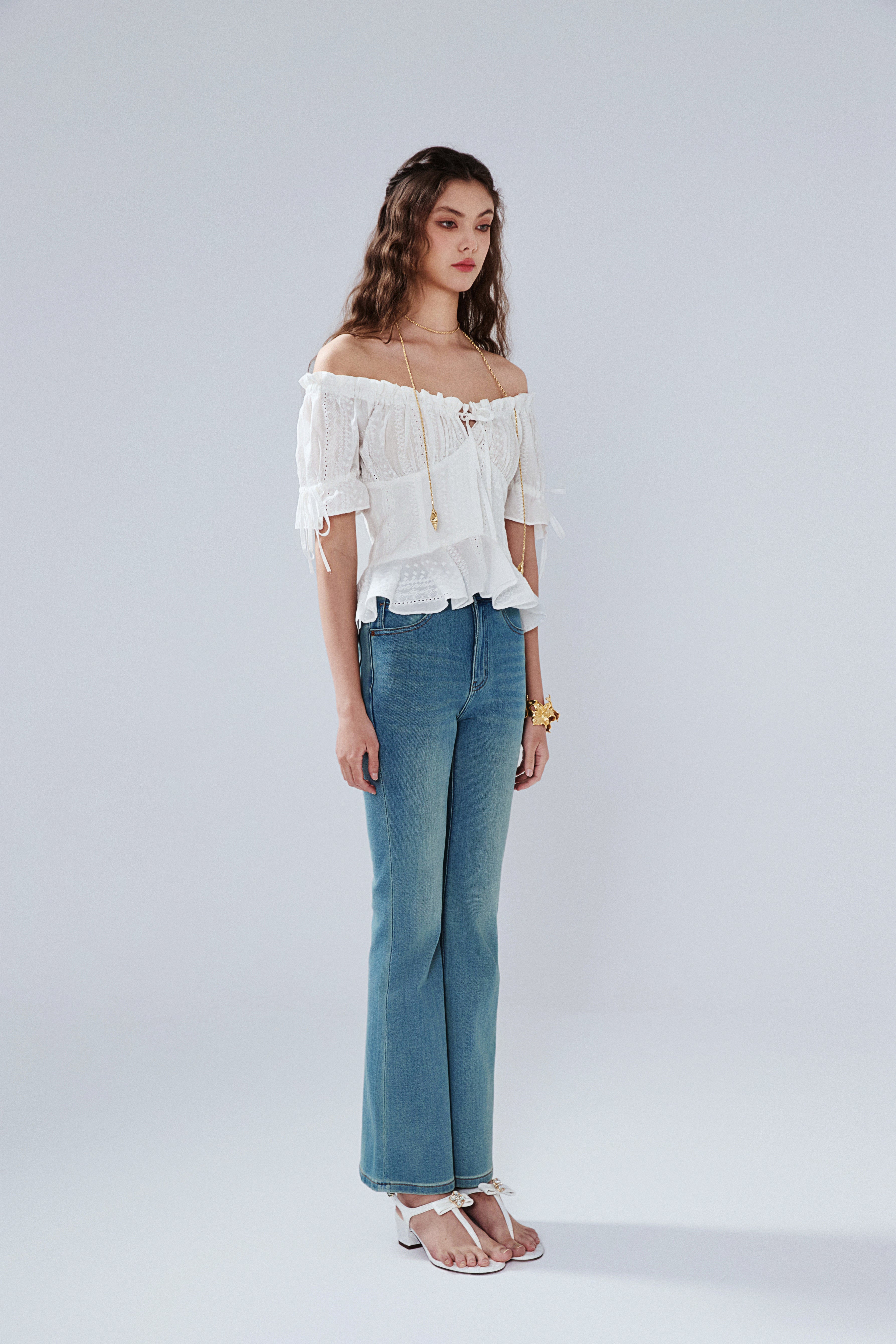 Flared Jeans With Lace Pockets