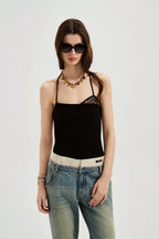 Black halterneck knit top with lace panels