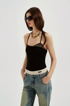 Black halterneck knit top with lace panels