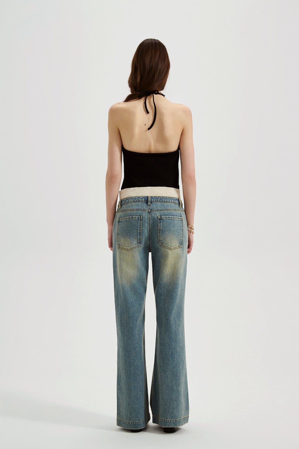 Black halterneck knit top with lace panels