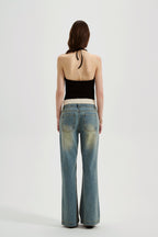 Black halterneck knit top with lace panels