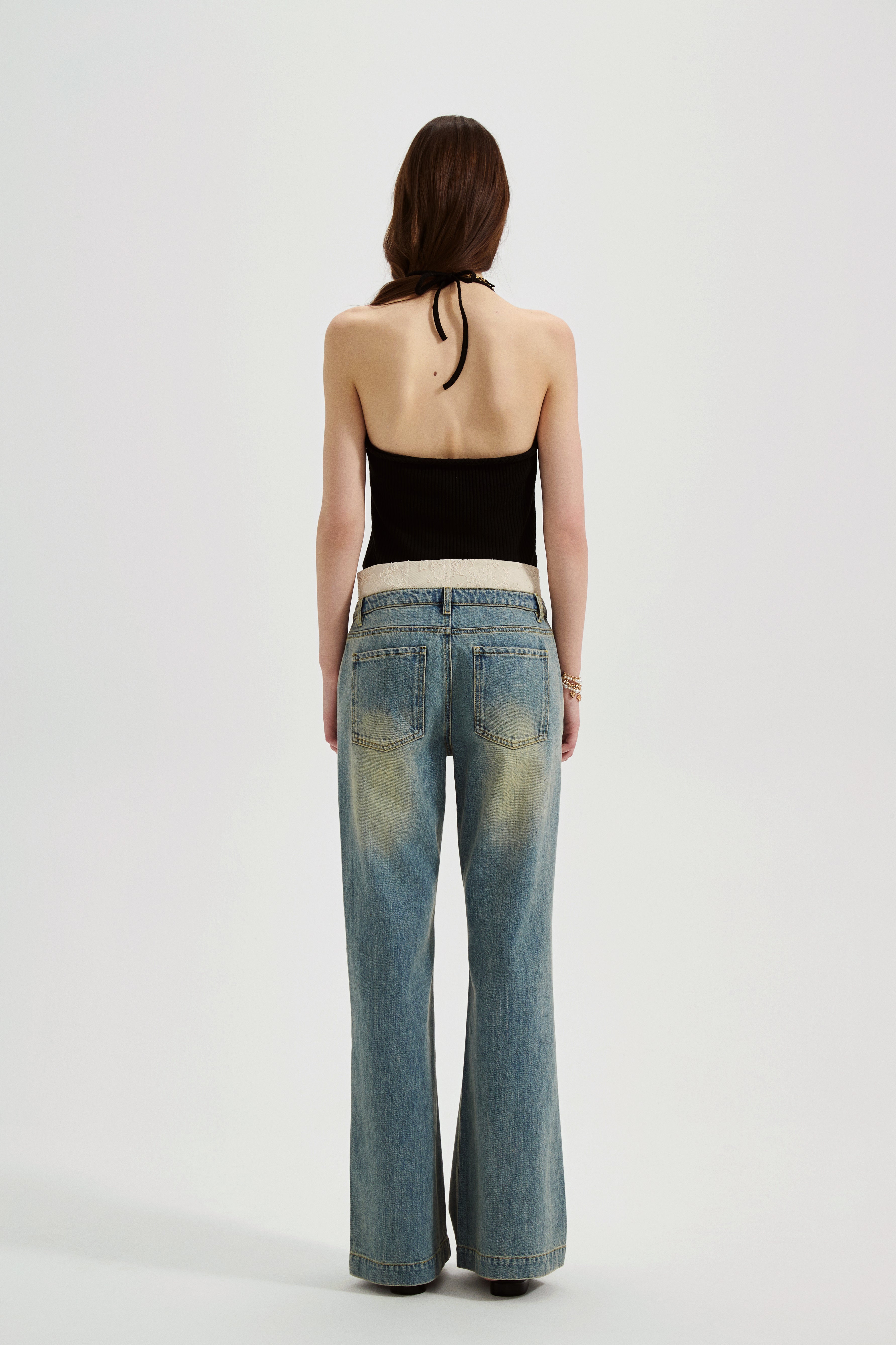 Black halterneck knit top with lace panels