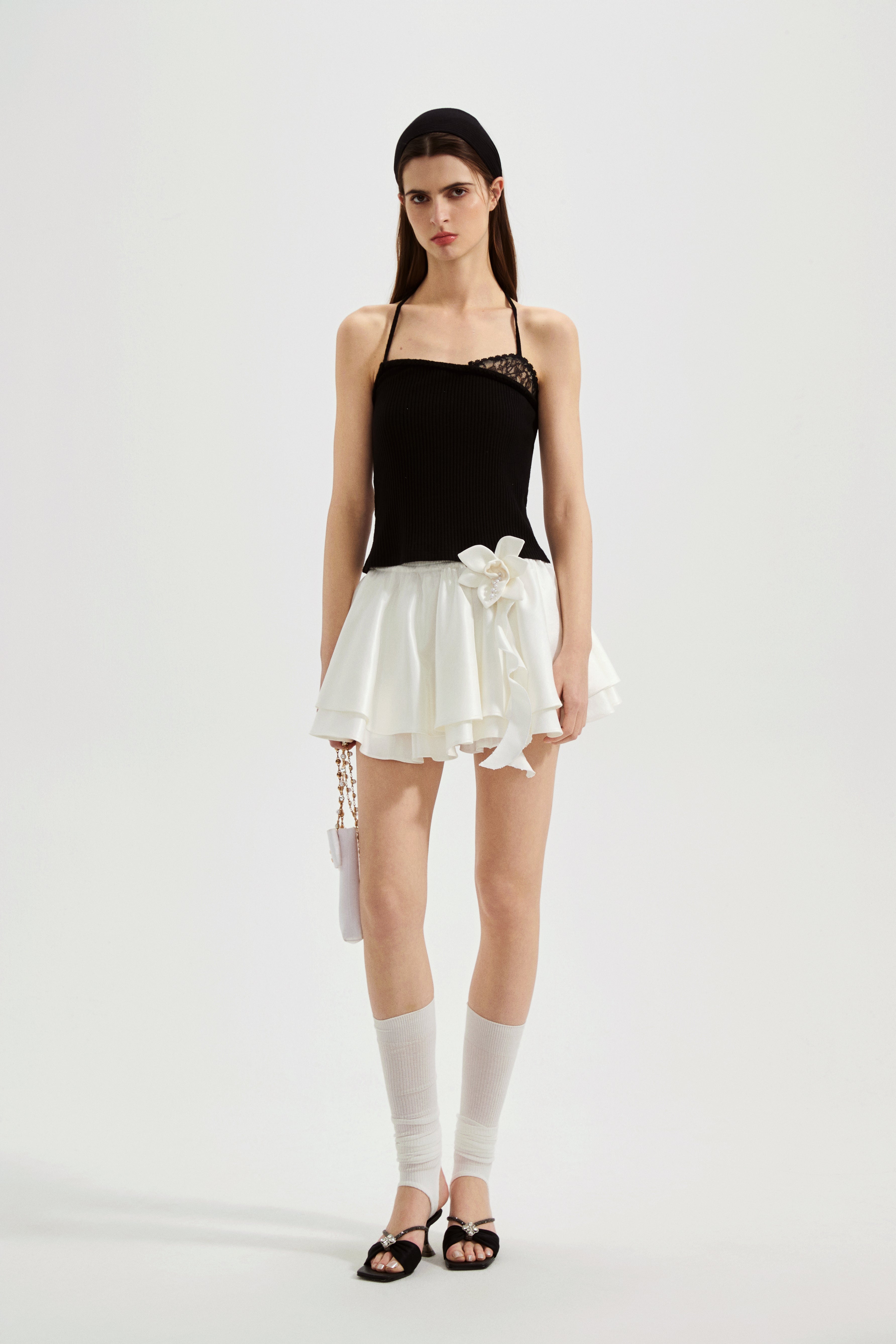 Black halterneck knit top with lace panels