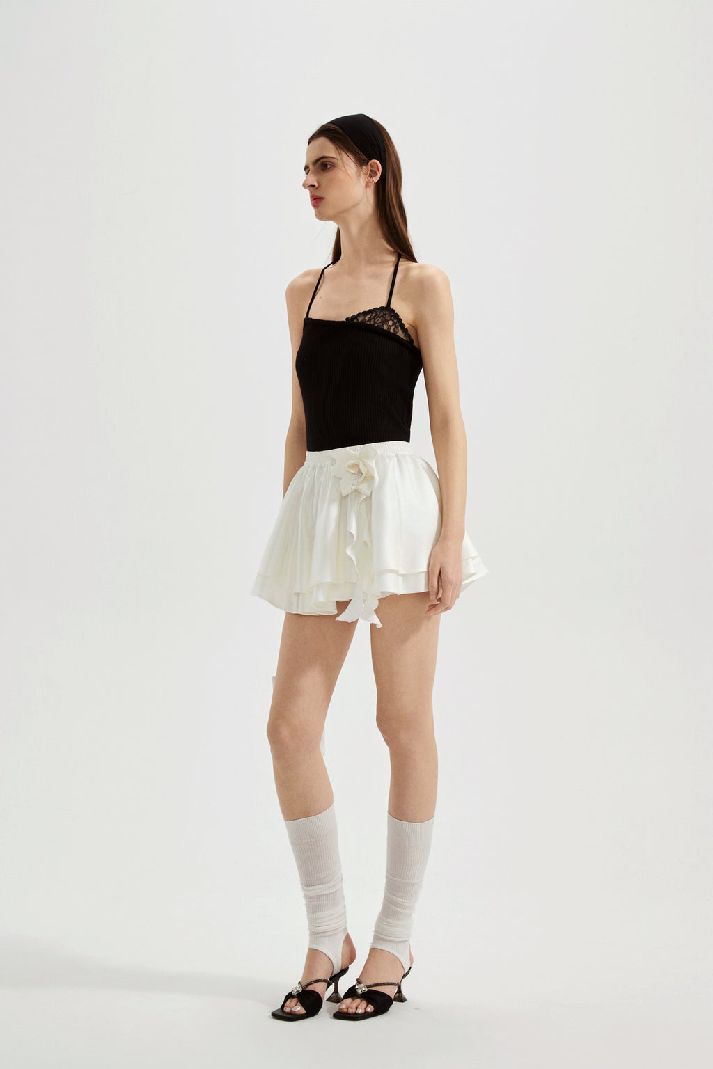 Black halterneck knit top with lace panels