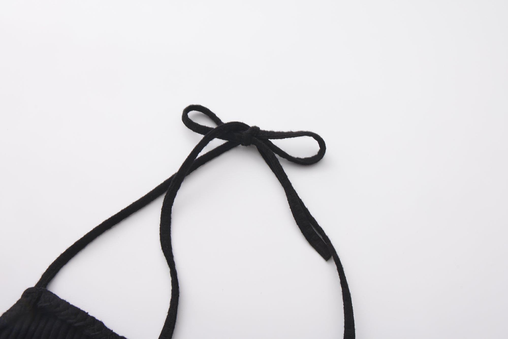 Black halterneck knit top with lace panels