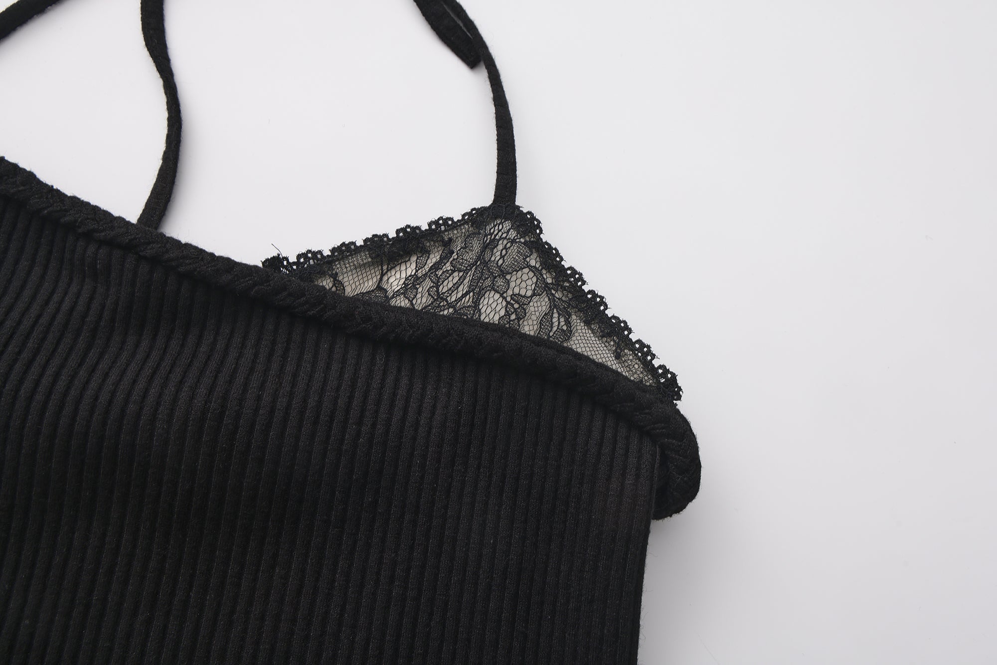 Black halterneck knit top with lace panels