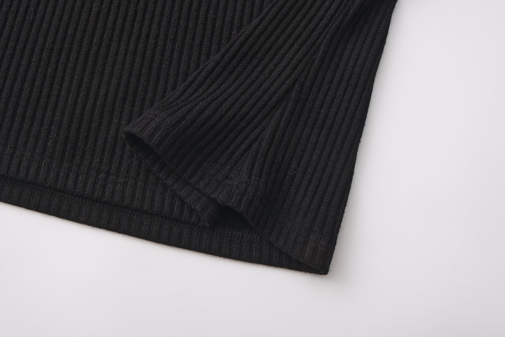 Black halterneck knit top with lace panels