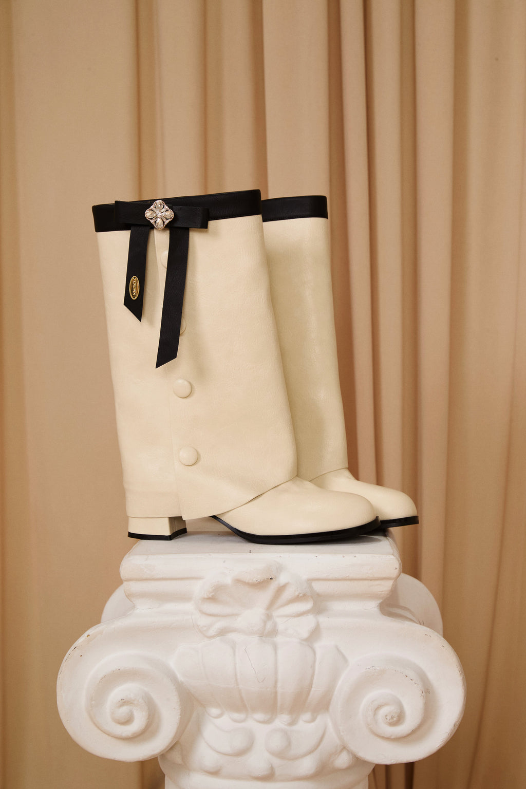 White & Black Spliced Bow Shaft Ankle Boots