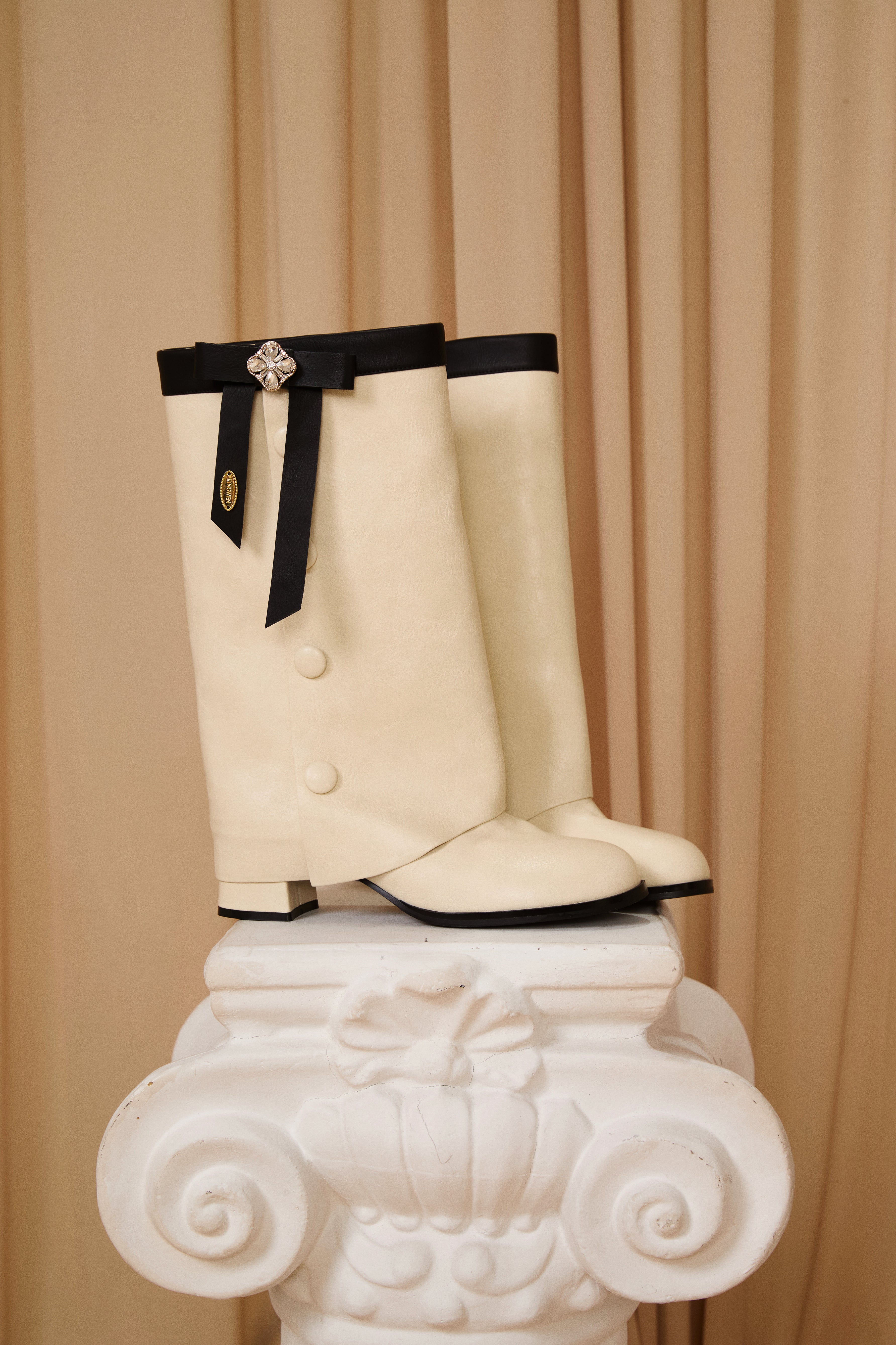 White & Black Spliced Bow Shaft Ankle Boots