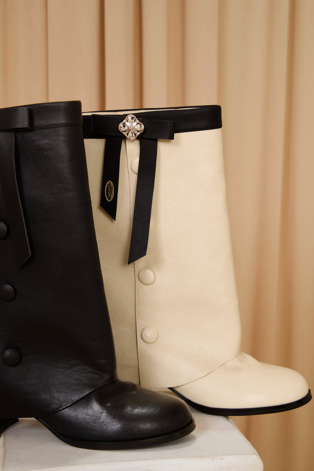 White & Black Spliced Bow Shaft Ankle Boots