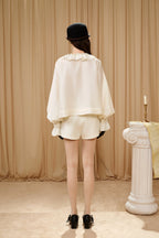 Oversized V-Neck Tie Top with Sequin Ruffle Trim