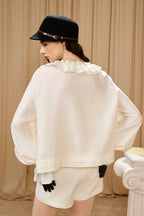 Oversized V-Neck Tie Top with Sequin Ruffle Trim