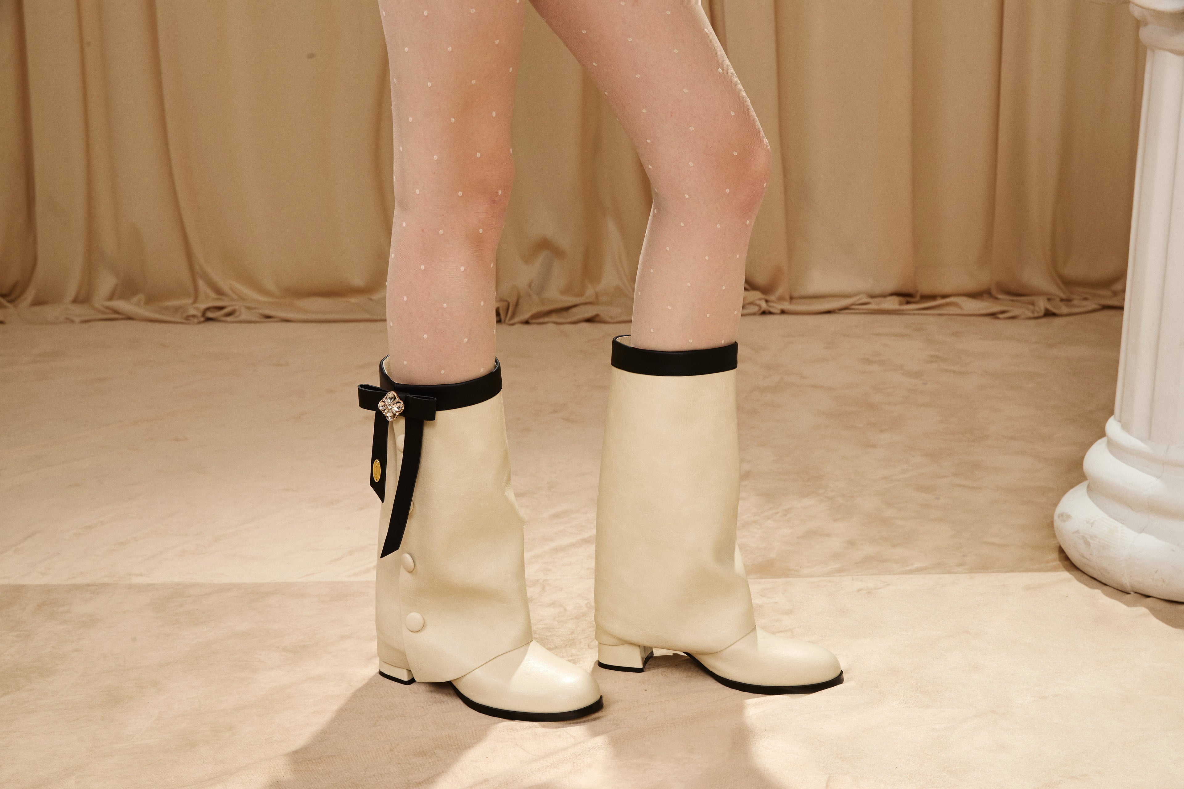 White & Black Spliced Bow Shaft Ankle Boots