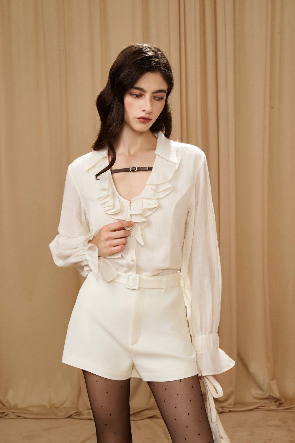 Beige V-Neck Blouse with Belt Buckle & Ruffle Trim