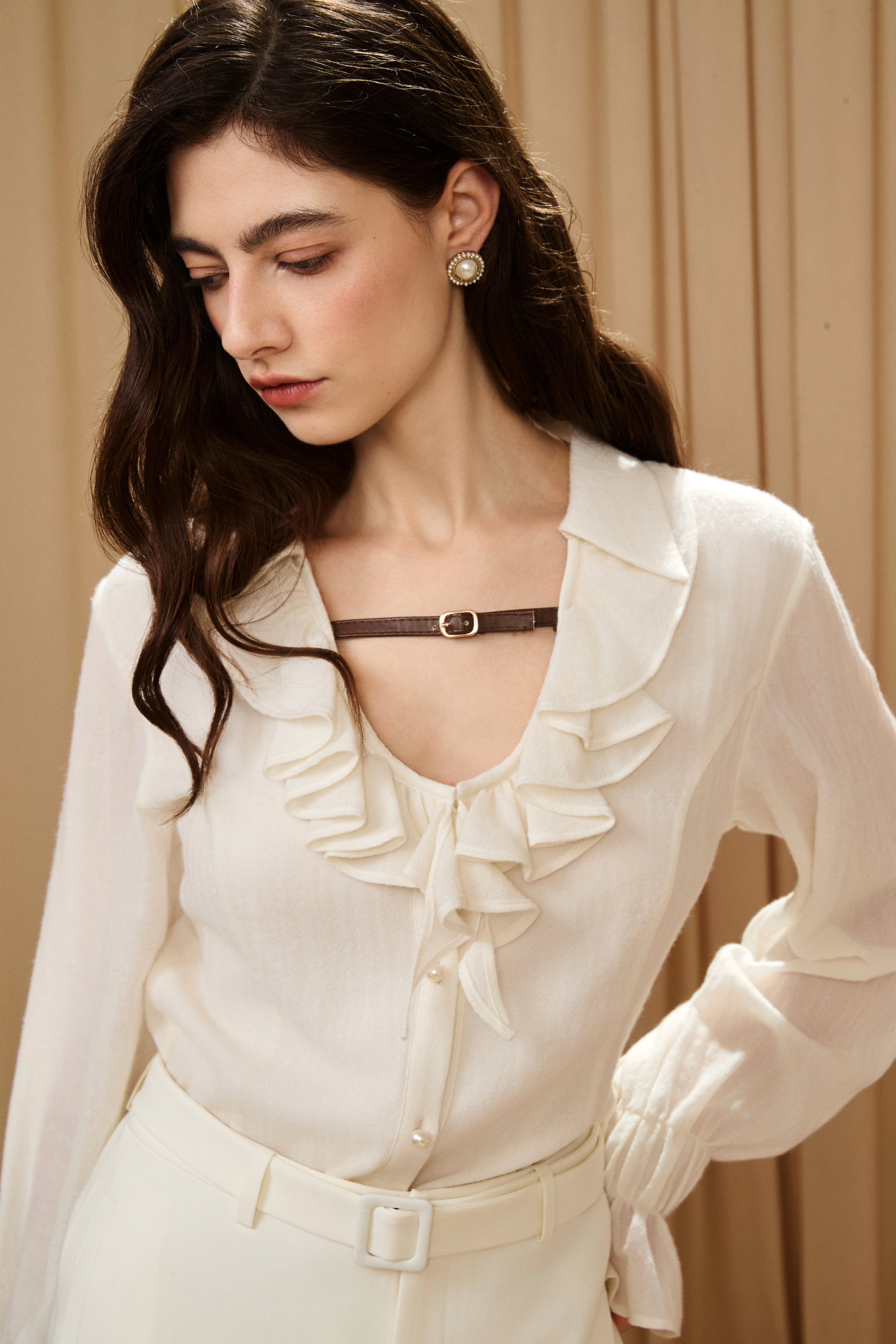 Beige V-Neck Blouse with Belt Buckle & Ruffle Trim