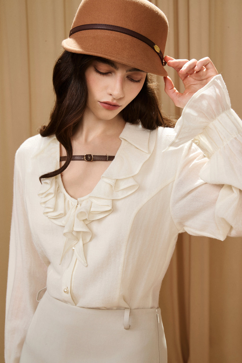 Beige V-Neck Blouse with Belt Buckle & Ruffle Trim