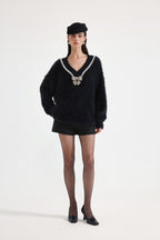 Black Bow Draped Chain Sweater