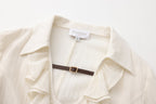 Beige V-Neck Blouse with Belt Buckle & Ruffle Trim