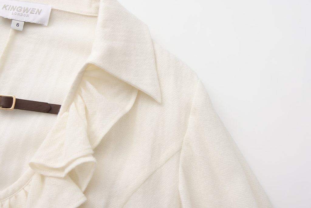 Beige V-Neck Blouse with Belt Buckle & Ruffle Trim