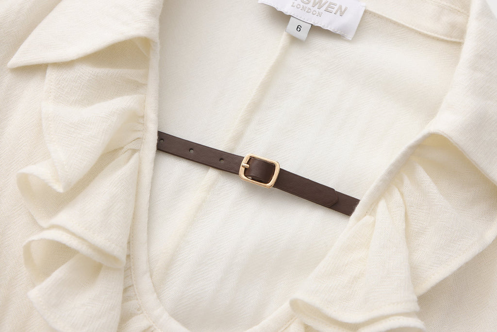 Beige V-Neck Blouse with Belt Buckle & Ruffle Trim