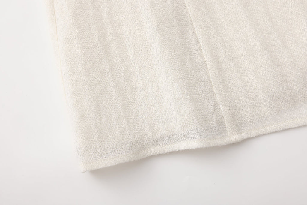 Beige V-Neck Blouse with Belt Buckle & Ruffle Trim