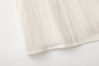 Beige V-Neck Blouse with Belt Buckle & Ruffle Trim