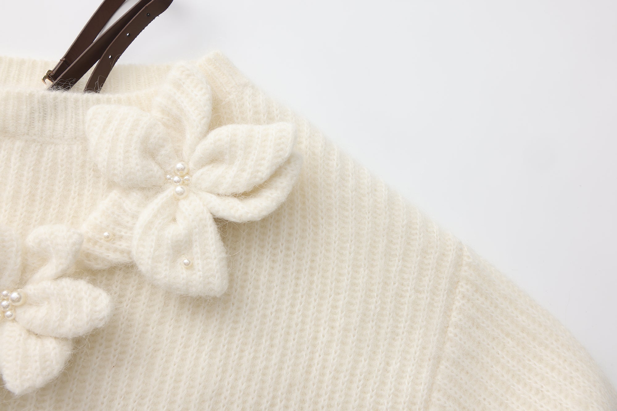 White Off-Shoulder Leather Buckle Iris Pattern Sweater