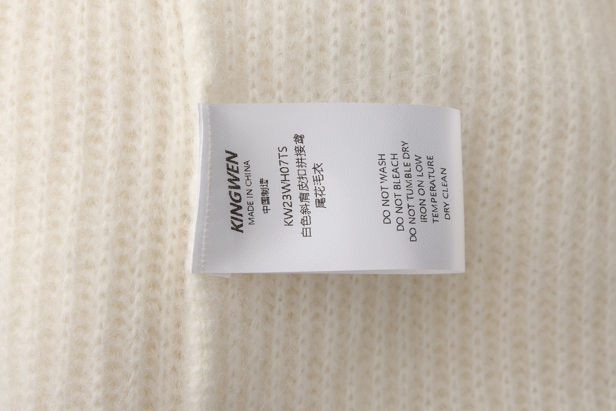 White Off-Shoulder Leather Buckle Iris Pattern Sweater