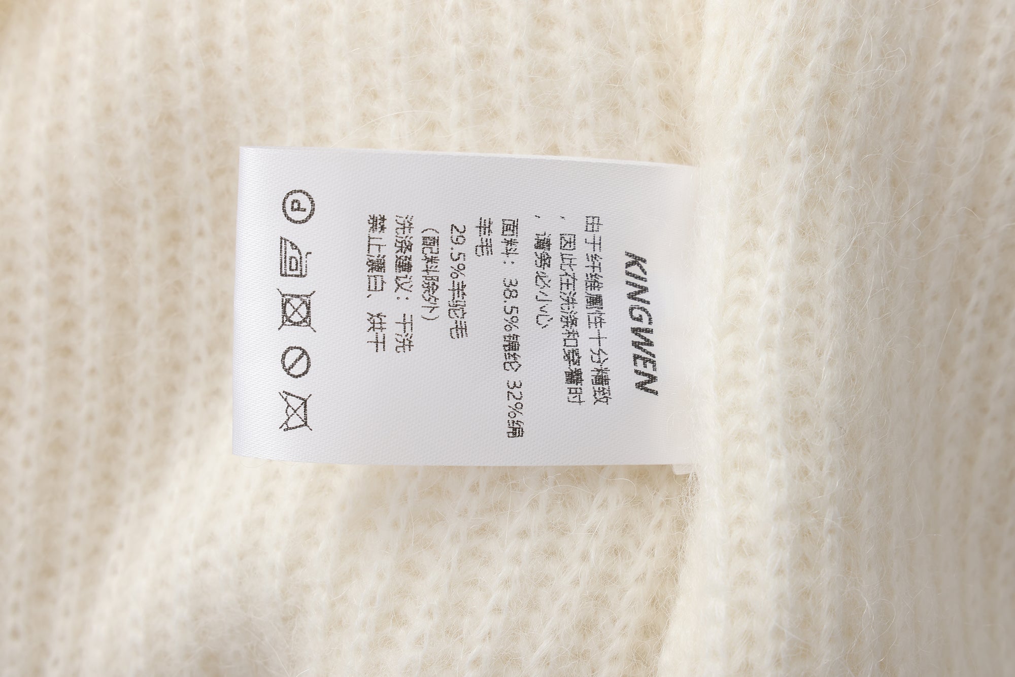 White Off-Shoulder Leather Buckle Iris Pattern Sweater