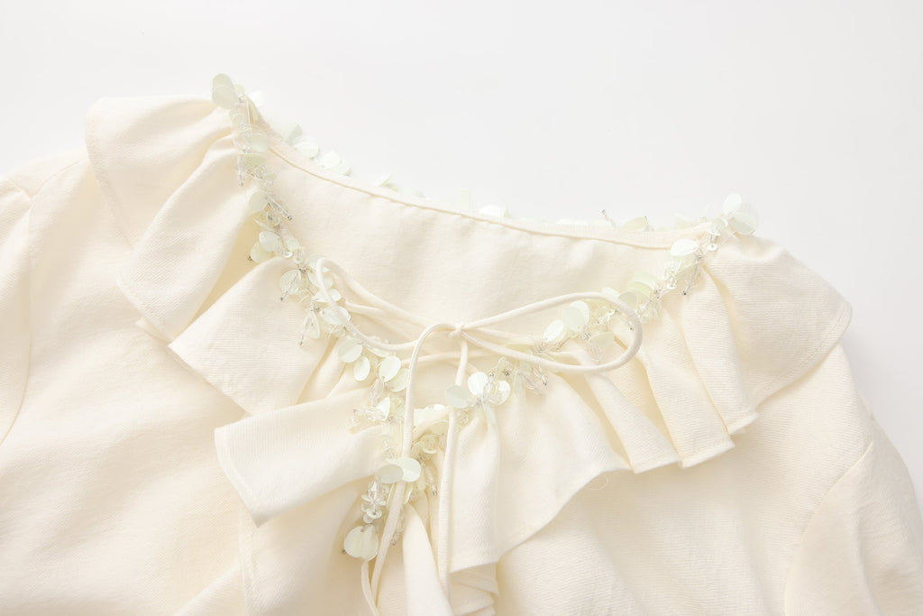 Oversized V-Neck Tie Top with Sequin Ruffle Trim