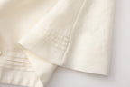 Oversized V-Neck Tie Top with Sequin Ruffle Trim