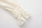 Oversized V-Neck Tie Top with Sequin Ruffle Trim