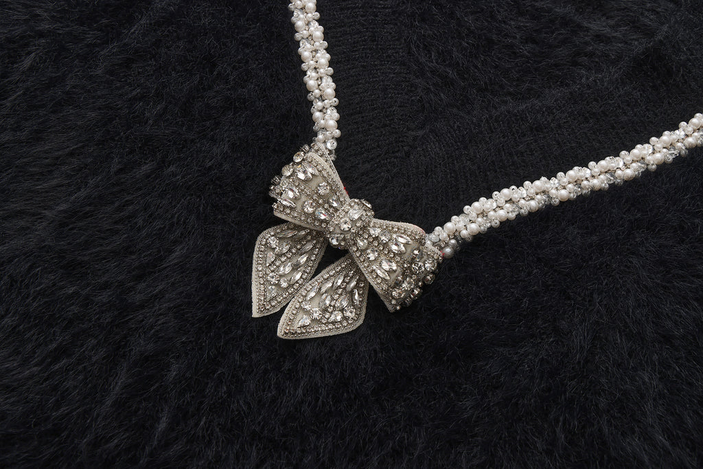 Black Bow Draped Chain Sweater